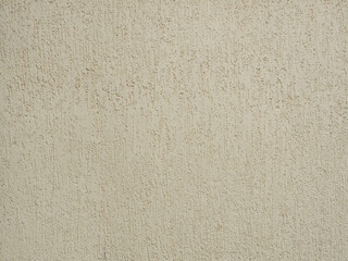 Beige wall with decorative plaster with patterned scratches. Texture not seamless. Full screen photo