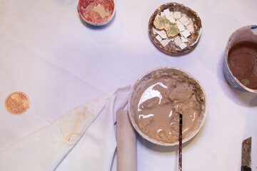 working table of a ceramist, clay workshop