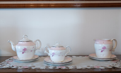 Antique crockery consisting of jug, plates and jug for tea