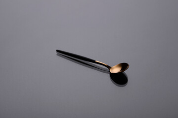 Cutlery on a gray background with shadow. Table serving