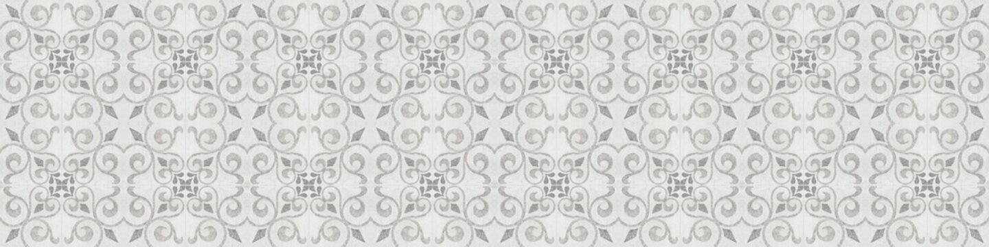 Old gray grey white vintage shabby damask floral flower leaves patchwork tiles stone concrete cement wall texture background banner panorama