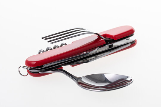 Multifunctional tool suitable for travel, includes knife, spoon, fork, bottle opener, corkscrew