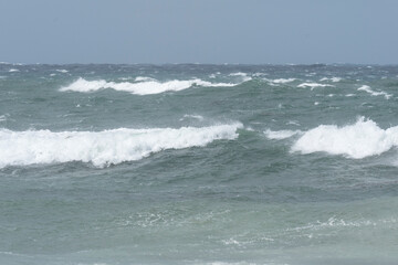 Waves breaking on the beach