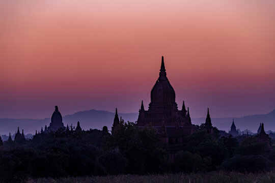SUNSET, TEMPLES OF BAGAN, MYANMAR - 30 January 2018: Silhouette of iconic bagan temple shape at sunset.