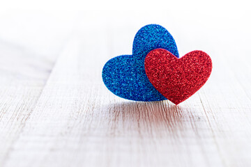 Valentines day minimal: red love hearts candle on wooden background. Sainte Valentine, mothers day,...