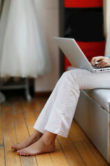 Fashion young woman using a laptop computer