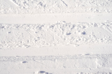 Ski track on the white snow
