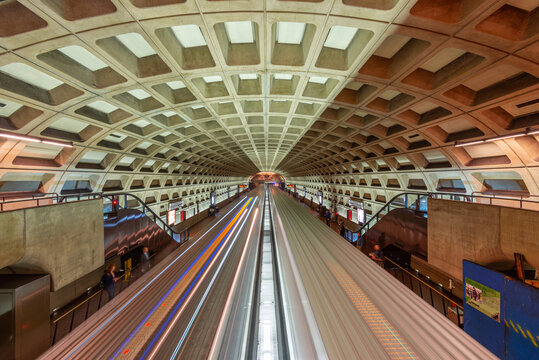 WASHINGTON, D.C. - APRIL 10, 2015: Trains and passengers in a Metro Station. Opened in 1976, the Washington Metro is now the second-busiest rapid transit system in the U.S.