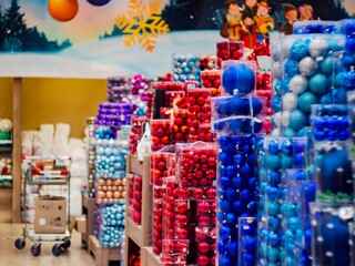 Christmas toys in the store of different types and colors