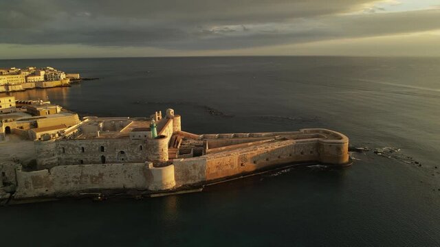 Castle Maniace from the height in Ortigia (Ortygia) island in Siracusa (Syracuse) in Sicily Aerial view of the lighthouse of the Maniace castle