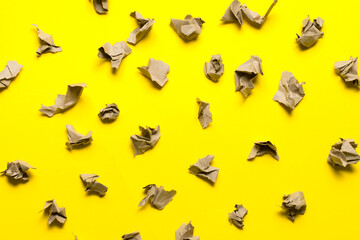 pieces of craft paper on a yellow background. place for text.