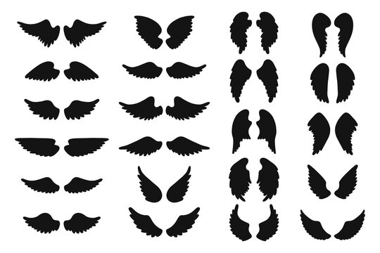 Set of hand drawn angel or bird wings silhouettes. Monochrome drawing elements. 