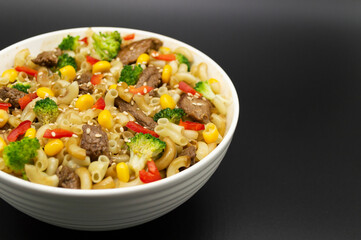 Asian food, meat with vegetables and sesame