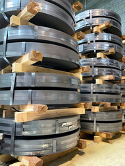 detail of a steel coil stacked one on top of the other, raw material, cold stamping, vertical