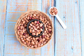 
Natural bean grains
Phaseolus vulgaris on blue grain wood background