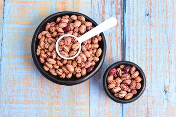 
Natural bean grains
Phaseolus vulgaris on blue grain wood background