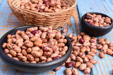 
Natural bean grains
Phaseolus vulgaris on blue grain wood background