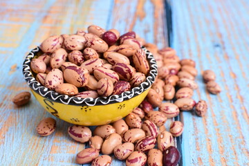
Natural bean grains
Phaseolus vulgaris on blue grain wood background