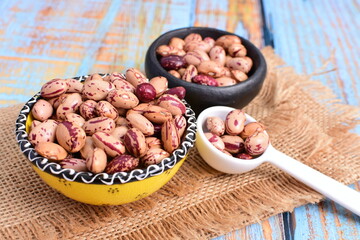 
Natural bean grains
Phaseolus vulgaris on blue grain wood background
