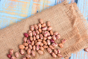 
Natural bean grains
Phaseolus vulgaris on blue grain wood background
