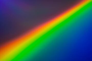 Blurred bright diagonal rainbow light refraction overlay effect for mockups. Organic diagonal holographic flare on a light wall Shadows for natural light effects. Trendy creative gradient.