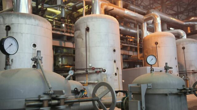 Manometer pipes and valve in boiler room. Thermal power plant piping at modern factory. Sugar beet production plant
