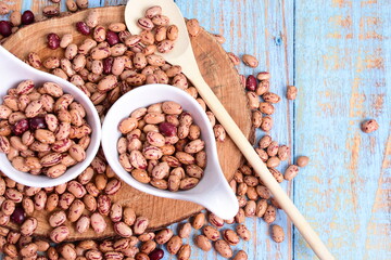 
Natural bean grains
Phaseolus vulgaris on blue grain wood background