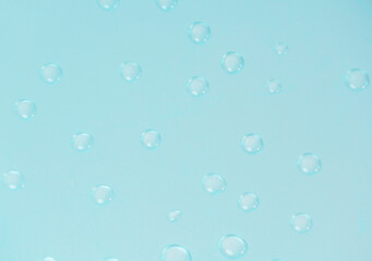 small drops of water on a turquoise background