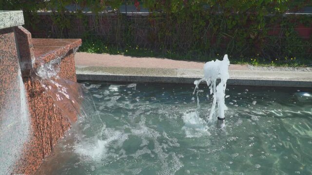 Fountain with water in city center