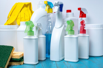 Cleaning and Disinfecting Your Home.large and small bottles and sprays with cleaning agents and cleaning tools