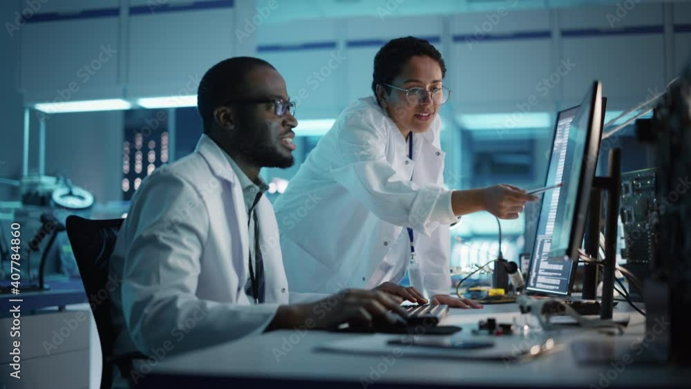 Aufkleber electronics research, development facility: engineer project manager talks with scientist working on