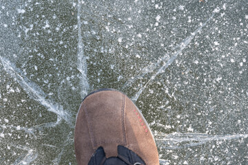 Person On Thin Ice Sheet, This Breaks - Close-up