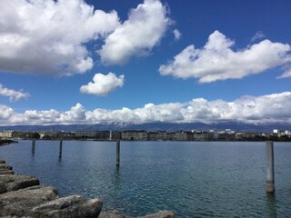 Fototapeta premium Lehman lake in Geneva with large clouds