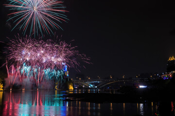 Fototapeta premium Fireworks near the Bitan Suspension Bridge with fireworks at Xindian District