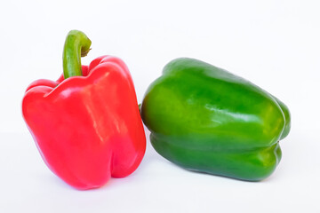 Red, green sweet pepper on a white background. Close up view.