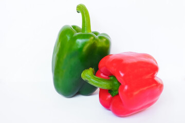 Red, green sweet pepper on a white background. Close up view.