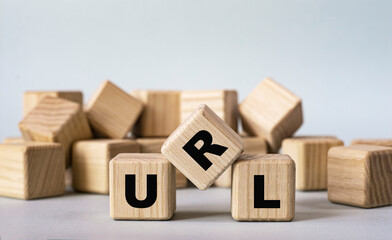 URL - acronym on wooden cubes on a light background