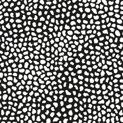 Abstract vector circles seamless vector pattern. Random placed irregular dots all over print with black background.