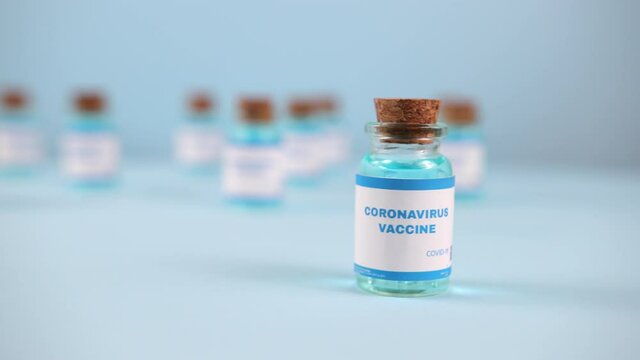 New vaccine pfizer and biontech isolated on blue background. Covid-19, 2019-ncov pandemic. Coronavirus inoculation concept. Sars-cov-2. Ready-made preparations with doses