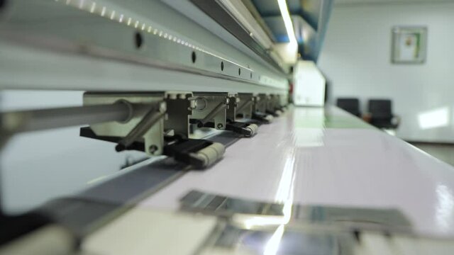 Wide digital printing on self adgesive film. Digital Flex printing machine