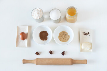 ingredients for making cookies, flour in a glass, sugar, honey, butter, badian, egg, caoritsa, ginger, badian