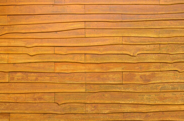 background and texture of wooden cover finishing wall made from wood slab on vintage house style.