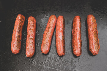 plant-based food, vegan plant-based mock meat sausages on outdoor barbecue