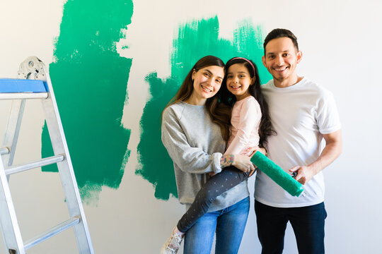 Latin family decided to repaint the walls of their house