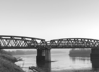 Train crosses Cremona Piacenza bridge over the Po river