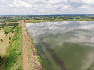 Drone shot aerial view scenic landscape of river reservoir dam and the forest