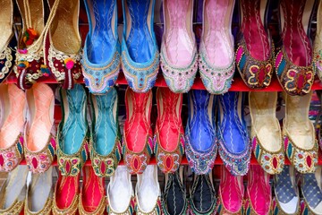 Variety of colorful women's shoes in old souk dubai