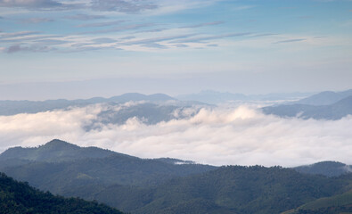 Fototapeta premium Morning view on the mountain full of fog on top.