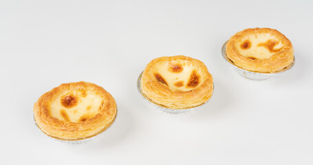 Baked egg tart on white background
