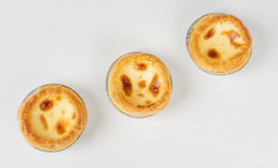 Baked egg tart on white background
